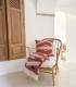 Sofa Blanket Mapu Garnet on a chair