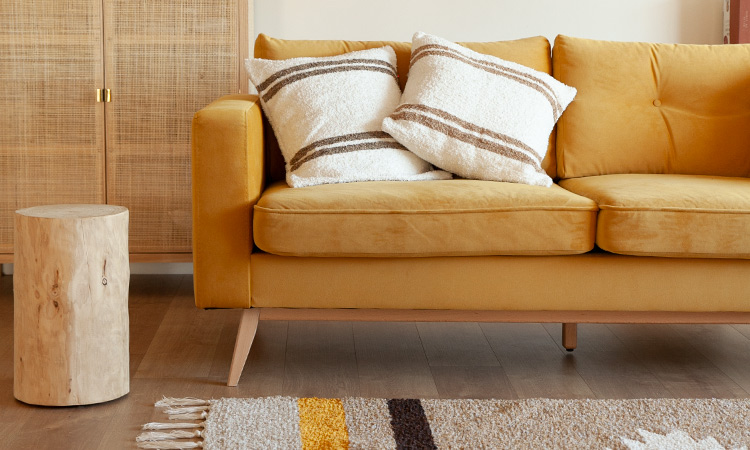 Sofa with white sheepskin cushions